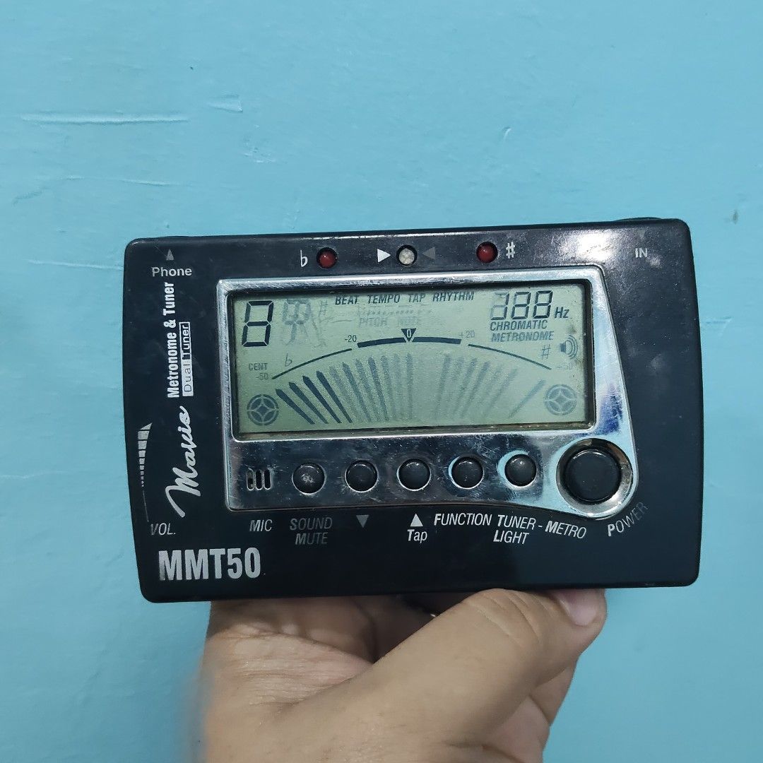 Mavis MMT50 Tuner & Metronome (Category: Musical Instruments) located in Catbalogan. Submitted by jpnsrpls (Listing ID 1404542609, Image 1). Description: Mavis MMT50 Tuner & Metronome (Japan Surplus) 2-in-1 Essential: Chromatic Tuner & Metronome combo unit. Versatile: Works for guitar, bass, violin, and most other instruments. Features: Bright LCD, built-in mic/speaker, tap tempo function. Condition: Reliable Japan surplus, tested & working great
