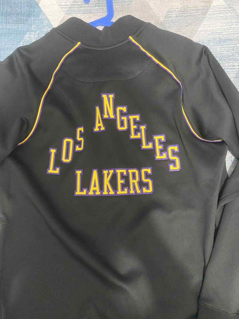 Nike Los Angeles Lakers NBA Jacket (Category: Coats, Jackets and Outerwear) located in Taytay. Submitted by zipzyzan (Listing ID 1404511588, Image 2). Description: - Official Nike Los Angeles Lakers jacket - Features Lakers logo on front - "LOS ANGELES LAKERS" printed on the back - Includes NBA logo patch - Made with Dri-FIT technology - Full zip closure - Two front pockets - Made in Thailand Lakers NBA Jacket and Jogger package 9,999 Per pc pric