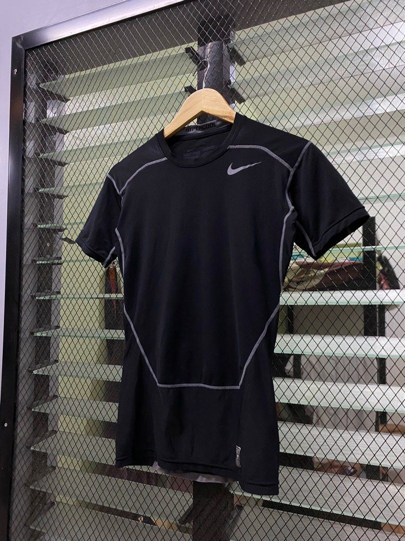 Nike Pro Combat Hypercool Shirt (Category: Activewear) located in Carmen. Submitted by bossbossingthriftshop (Listing ID 1404489027, Image 2). Description: Nike Compression Shirt -GOOD CONDITION -AS NEW -8.5/10 COLOR RATE L - 26 W - 16 MINE ₱249 FREE SHIP.