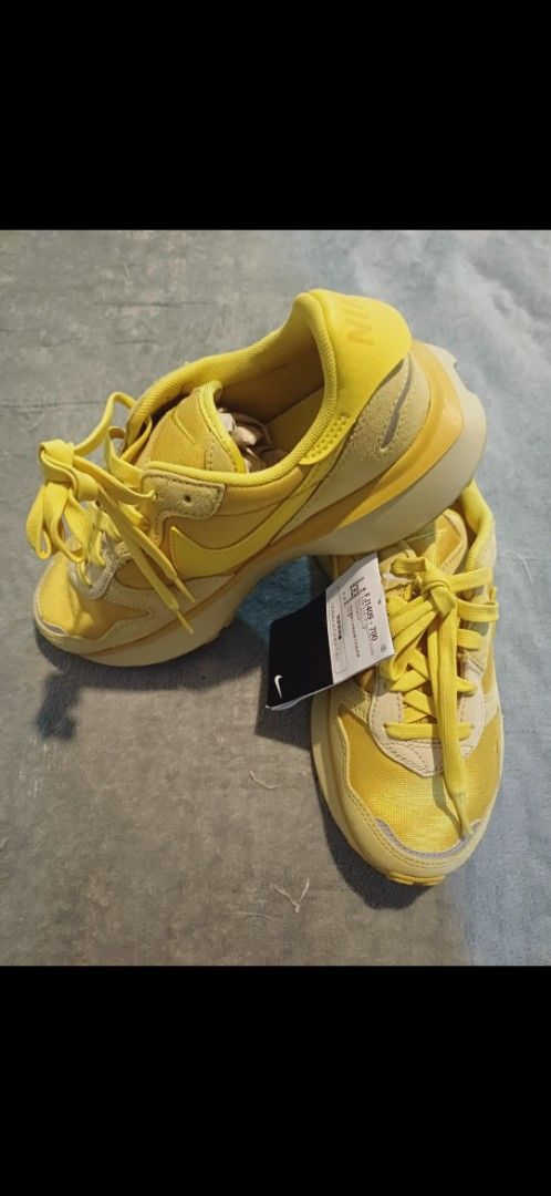 Nike Waffle Debut Yellow Sneakers (Category: Sneakers) located in Gumaca. Submitted by m4ruh (Listing ID 1404541845, Image 2). Description: - Brand new Nike Waffle Debut sneakers - Vibrant yellow colorway - Features the iconic Nike logo - Includes original tag - Size tag visible in photos - Never been worn.