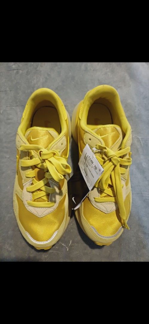Nike Waffle Debut Yellow Sneakers (Category: Sneakers) located in Gumaca. Submitted by m4ruh (Listing ID 1404541845, Image 1). Description: - Brand new Nike Waffle Debut sneakers - Vibrant yellow colorway - Features the iconic Nike logo - Includes original tag - Size tag visible in photos - Never been worn.