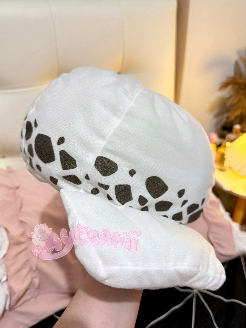 One Piece Trafalgar Law Hat Plush (Category: Caps & Hats) located in Subic. Submitted by ayusamicos (Listing ID 1404453540, Image 3). Description: - Trafalgar Law hat plush - Soft, plush material - Brand new with paper tag attached ❗️NOTE: This is a plush, not wearable. Good for display / collection. MOP: GCash. MOD: J&T Express. Shipping fee will be shouldered by the buyer..