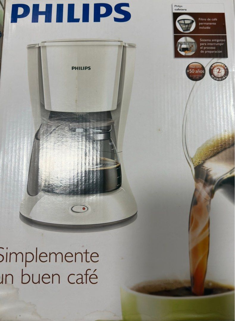 Philips Coffee Maker HD7447 (Category: Coffee Machines & Makers) located in Paranaque City. Submitted by Katgalanto (Listing ID 1404538383, Image 1). Description: - Philips coffee maker for home brewing. - Includes a permanent filter. - Features an advanced water level indicator. - White color and simple design. - Designed for making good coffee..