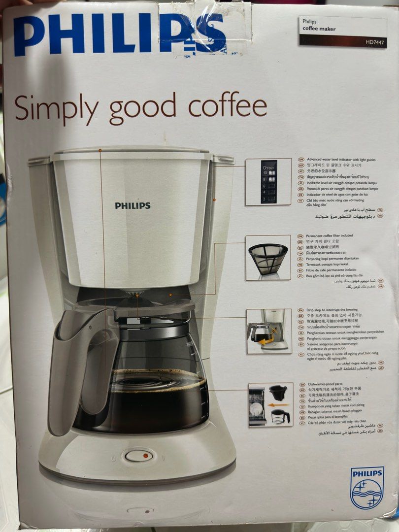 Philips Coffee Maker HD7447 (Category: Coffee Machines & Makers) located in Paranaque City. Submitted by Katgalanto (Listing ID 1404538383, Image 2). Description: - Philips coffee maker for home brewing. - Includes a permanent filter. - Features an advanced water level indicator. - White color and simple design. - Designed for making good coffee..