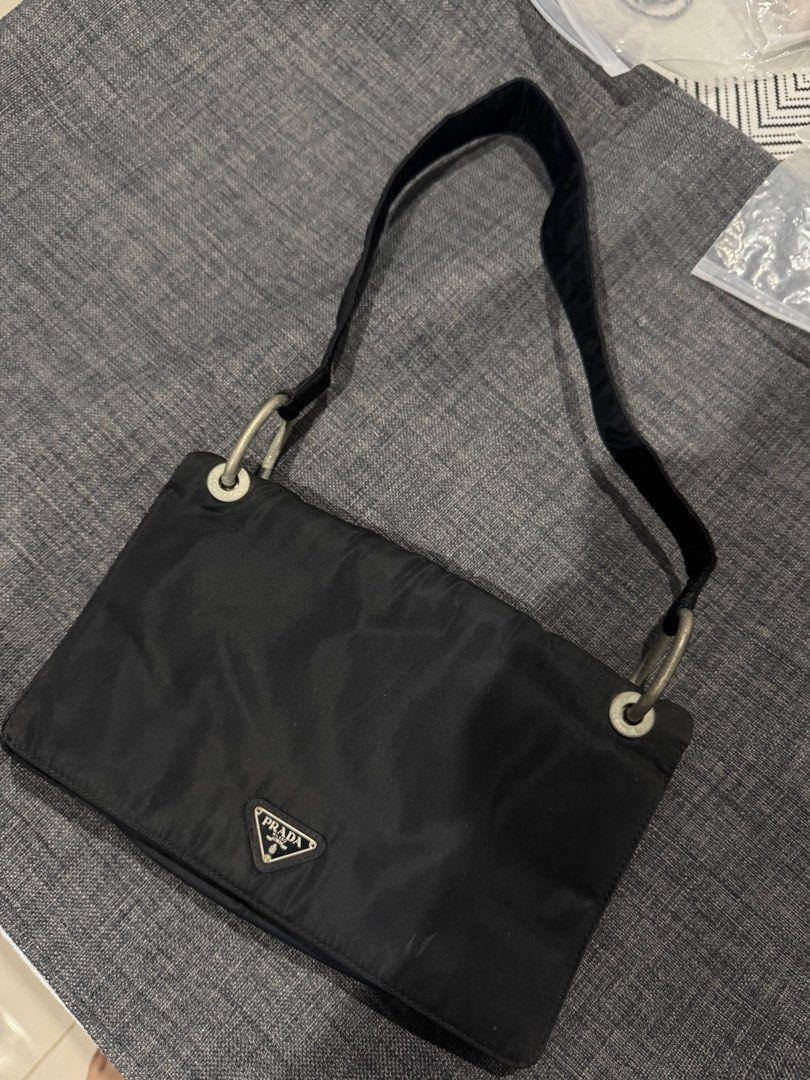 Prada Black Nylon Shoulder Bag (Category: Luxury Bags & Wallets) located in Manila. Submitted by absdeclutter (Listing ID 1404405789, Image 1). Description: Bought it a long time ago, stock in storage. .
