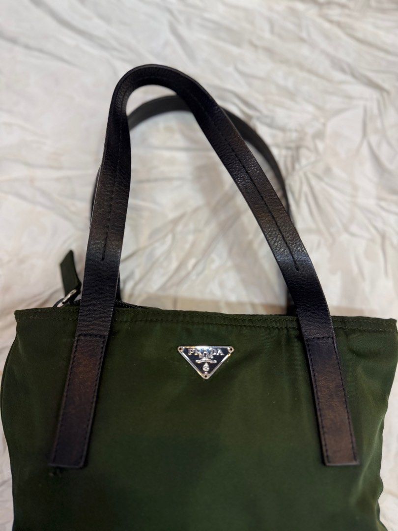 Prada Mini Hand Bag Nylon (Category: Luxury Bags & Wallets) located in Manila. Submitted by fivethousandlilies (Listing ID 1404551993, Image 3). Description: Guaranteed authentic Vintage good condition Can fit phone but not folding umbrella so its mini and cute Pm for more info.