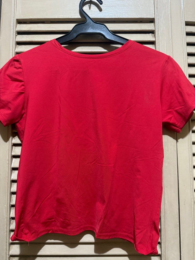 Red crop top (Category: Blouses) located in Quezon City. Submitted by preloved.declutter2024 (Listing ID 1404518315, Image 1). Description: Fits small to medium.
