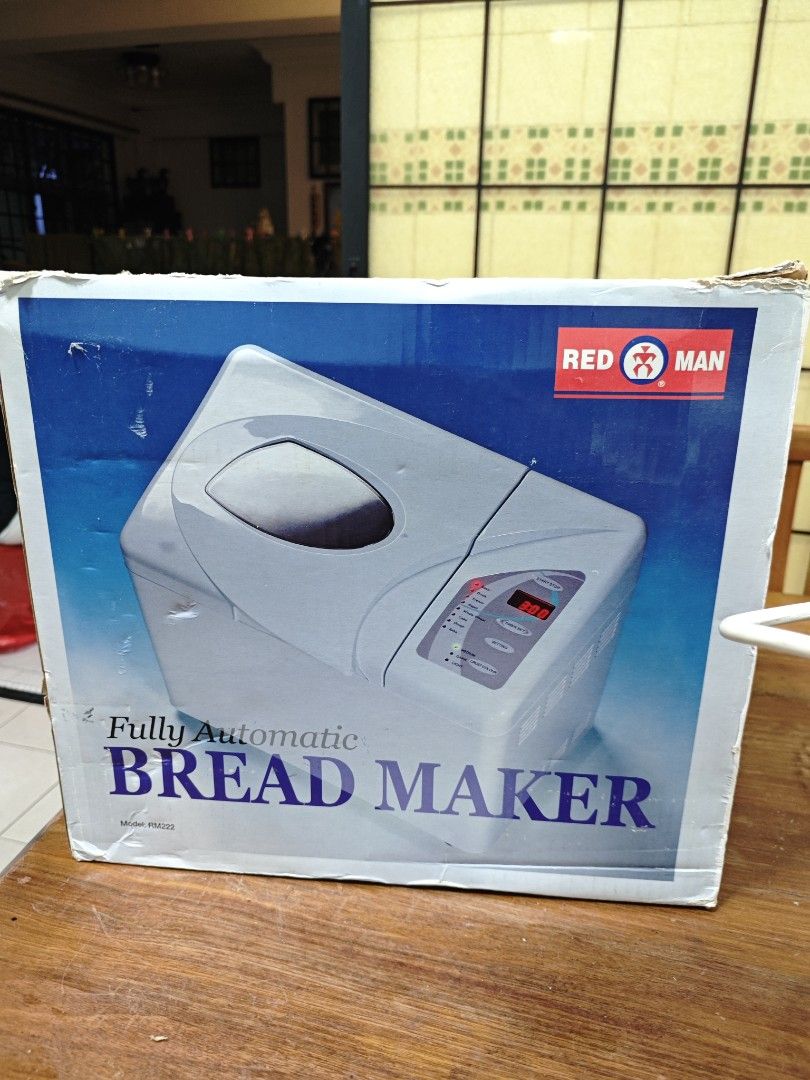 Red Man Fully Automatic Bread Maker (Category: Breadmakers) located in Singapore. Submitted by lakers_97 (Listing ID 1404401224, Image 1). Description: - Red Man bread maker - Fully automatic - Includes bread pan and kneading paddle - Perfect for baking bread at home.