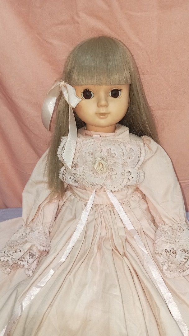 Sekiguchi doll (Category: Kids Toys) located in Roxas. Submitted by anelhey903 (Listing ID 1404497571, Image 2). Description: - Vintage Sekiguchi doll - Long, light-colored hair - Pink dress with lace detailing - Long sleeves and ribbon waist - Small bow in hair.