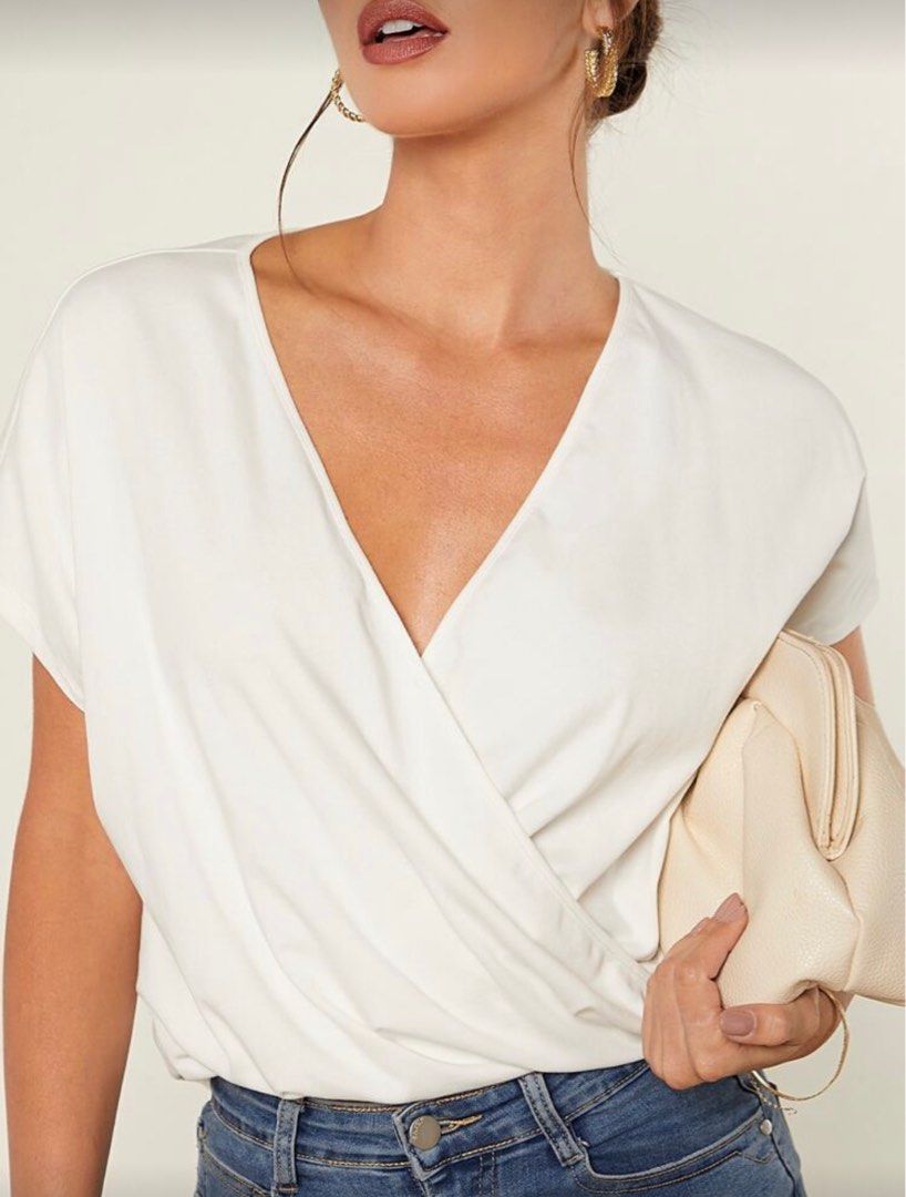 Shein White Top (Category: Shirts) located in Marikina City. Submitted by declutteringera (Listing ID 1404521117, Image 1). Description: - size S - fits up to 36" bust since it's loose - in good condition RFS: decluttering.