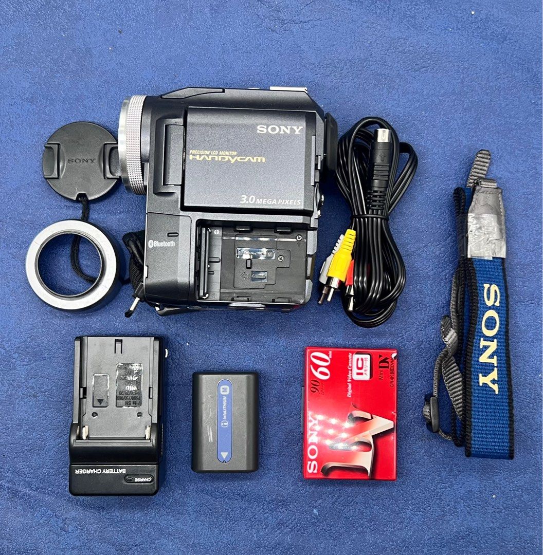 SONY DCR-PC300 Mini DV Camcorder (2004) RARE (Category: Video Cameras) located in Makati City. Submitted by maka-luma (Listing ID 1404476831, Image 3). Description: FULLY WORKING ✔️ Record ✔️ Fast Servo Zoom ✔️ Night Vision / Night framing ✔️ Bluetooth ✔️ Rewind ✔️ Pause/Stop ✔️ Fast forward ✔️ Color Viewfinder ✔️ Color LCD ✔️ Program AE ✔️ Tape eject ✔️ Memory stick recordable ✔️ Diverse settings ₱13,999 READY TO USE! 📹📼🔋Inclusions: Camera un