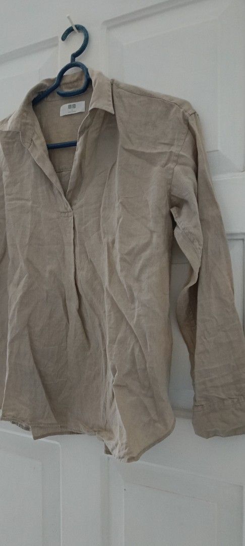 Uniqlo Linen Shirt (Category: Shirts) located in Paranaque City. Submitted by yesyesyo (Listing ID 1404434285, Image 2). Description: - Uniqlo linen shirt - Neutral beige color - Collared neckline - Long sleeves - Relaxed fit - Button-down design - Made in China - Size tag Small this is not thrifted. all are for personal decluttering only. payment thru Gcash delivery options: J&T and Lalamove please my other items, thanks! .