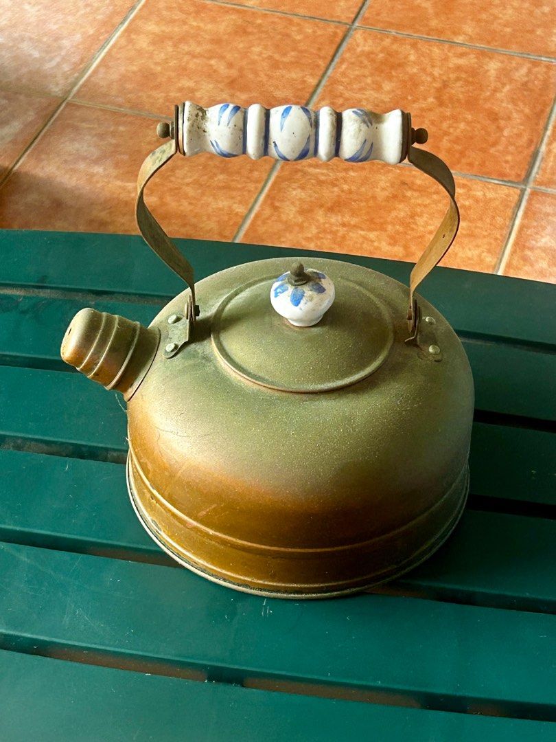 Vintage Copper and Brass Kettles (Category: Kettles & Airpots) located in Las Pinas. Submitted by rjmwings (Listing ID 1404503595, Image 2). Description: Vintage Copper Kettle Set Bought in a flea market in Brooklyn, New York in 1997 - Large kettle with ceramic handle and lid knob - Small copper pot with lid - Copper watering can All items are made of metal. Perfect for display in the kitchen or dining area For collectors of copper items.