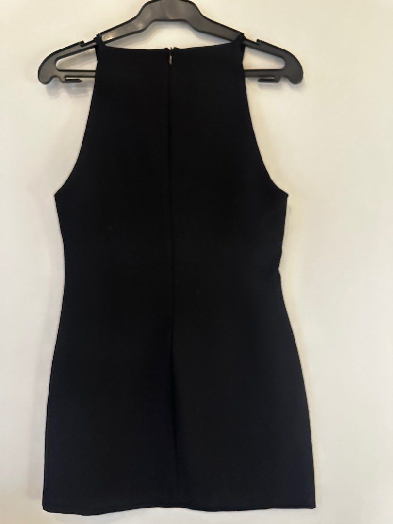 Zara Black Halter Mini Dress - Size S (Category: Dresses) located in Makati City. Submitted by michelle1208 (Listing ID 1404468397, Image 2). Description: - Zara black mini dress - Halter neckline - Size: S - Back zipper closure - Made in Morocco - Perfect for various occasions.