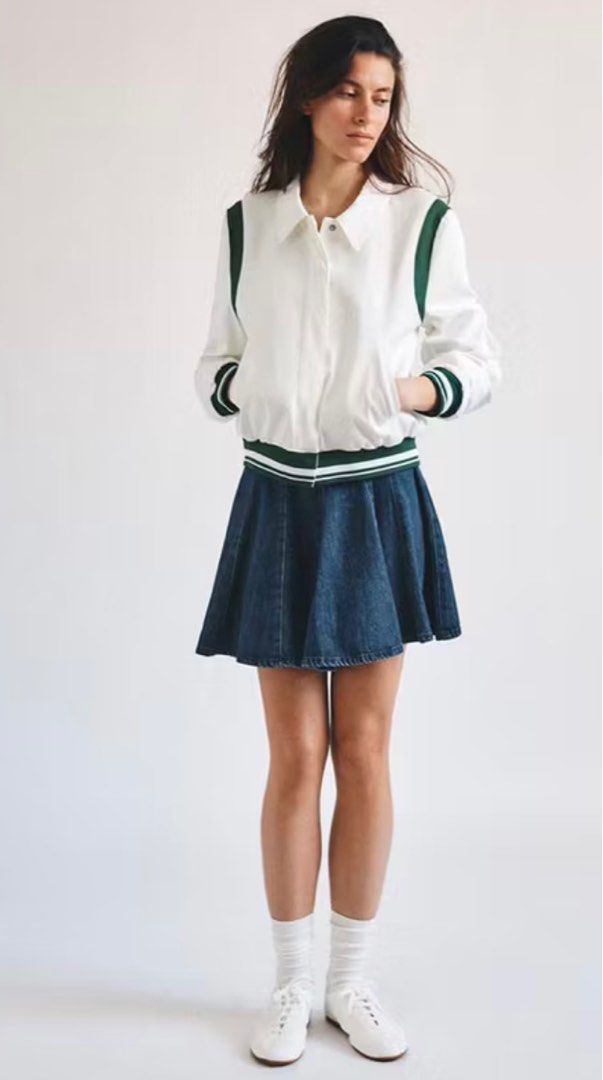 Zara White Varsity Jacket with Green Accents (Category: Coats, Jackets and Outerwear) located in Quezon City. Submitted by chamibee (Listing ID 1404481814, Image 3). Description: - White jacket with green accents - Collared neckline - Button-up front - Sporty, varsity-inspired design - Lightweight and suitable for layering - Striped cuffs and hem -Fits XS to Med frame.