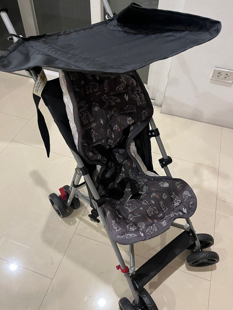 Anko Lightweight Stroller (Category: Strollers) located in Quezon City. Submitted by zakuretsu (Listing ID 1404605164, Image 2). Description: - Anko lightweight foldable stroller - Includes free washable seat padding - Includes a sunshade - Lightweight frame - Folds for easy storage - Black frame and wheels - Safety harness.