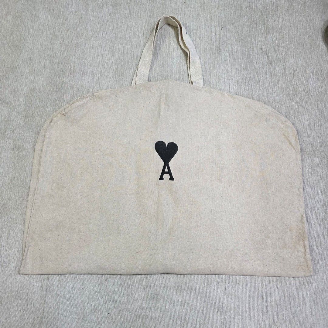Authentic AMI Garment Bag (Category: Luxury Bags & Wallets) located in Binangonan. Submitted by makoleksyon (Listing ID 1404630527, Image 1). Description: excellent condition like new no flaws bought in Japan 100% Authentic Money back guarantee.