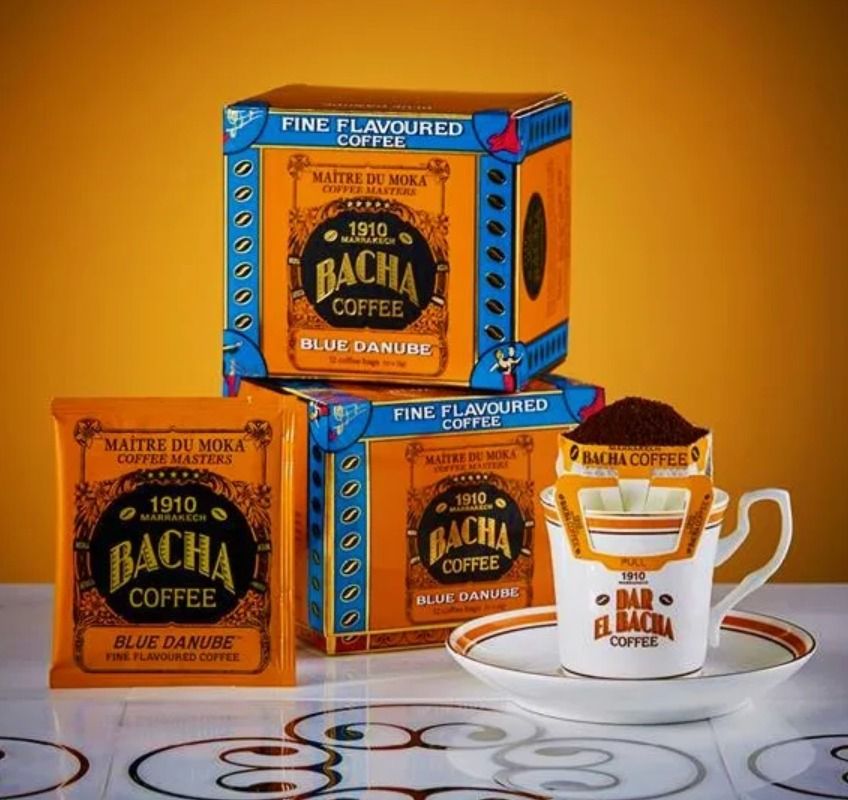 Bacha Coffee - Assorted Flavors (Category: Coffee Machines & Makers) located in Manila. Submitted by tampipi (Listing ID 1404681169, Image 3). Description: Enjoy a selection of Bacha Coffee's fine flavored coffee. The listing includes Blue Danube, Seville Orange, and Sweet Mexico flavors. Each box contains 12 coffee bags. Perfect for a quick and flavorful cup of coffee. The images show the coffee bags and boxes..