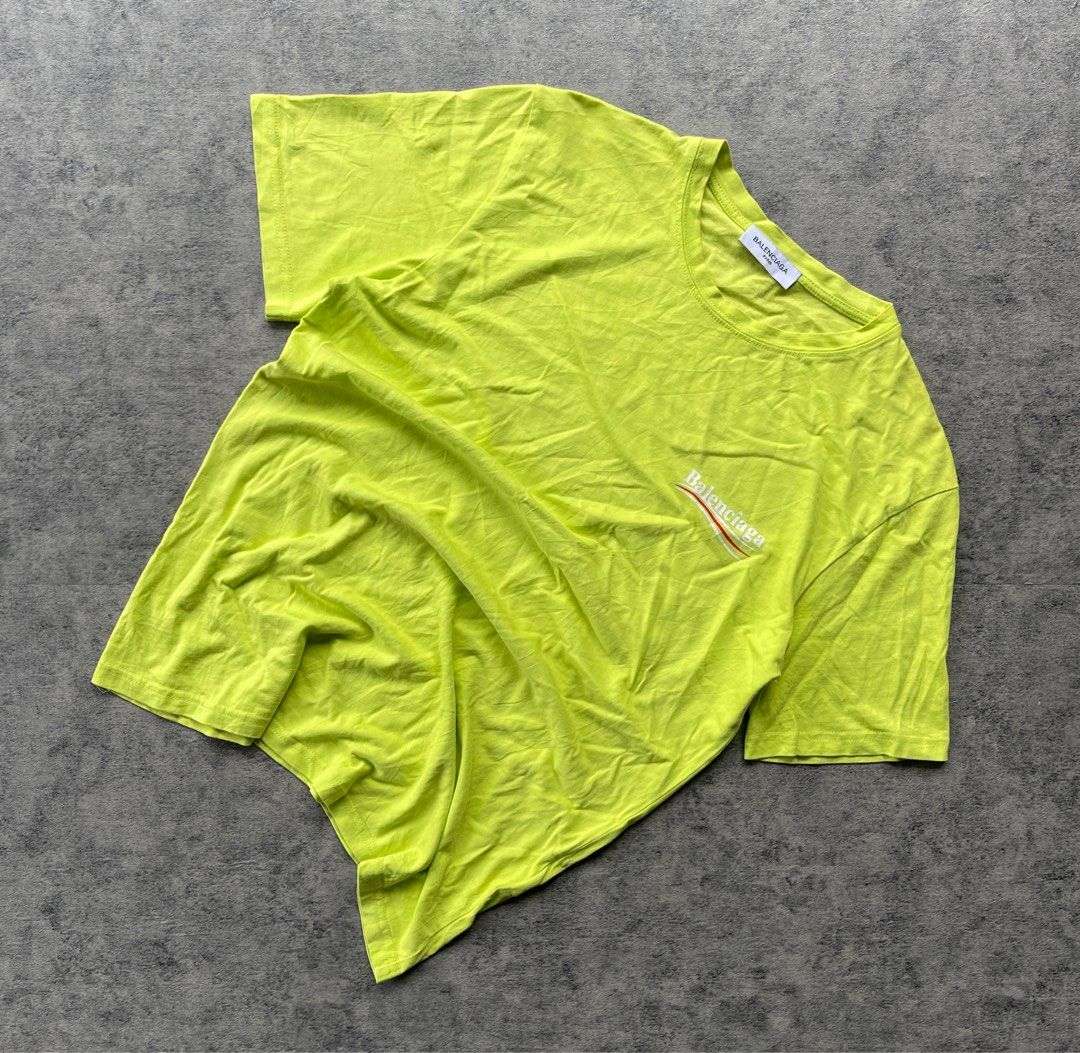 Balenciaga Tee Medium (Category: Tshirts & Polo Shirts ) located in Sorsogon. Submitted by vanbercs (Listing ID 1404719296, Image 3). Description: - Balenciaga T-shirt - Vibrant green color - Size Medium - Balenciaga logo on front and back - Measurements: Width 19.5", Length 27" - Stylish and comfortable.