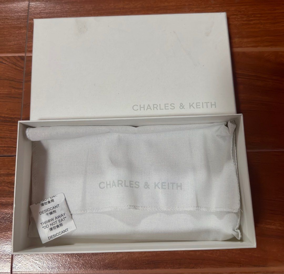 Charles & Keith Original Box and Wallet Pouch only (Category: Wallets & Card holders) located in Manila. Submitted by AAA09876 (Listing ID 1404611722, Image 1). Description: .