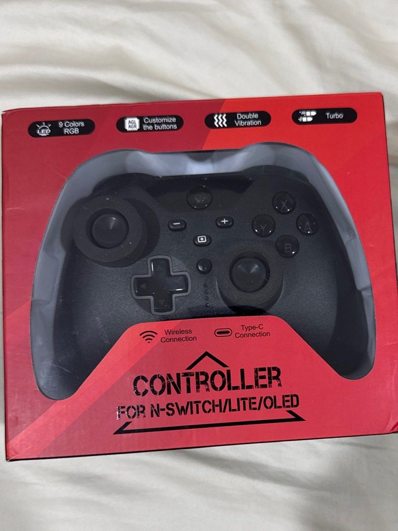 Controller for N-Switch/Lite/OLED (Category: Controllers) located in Kuala Lumpur. Submitted by choon_ray.69 (Listing ID 1404690122, Image 1). Description: Controller is designed for N-Switch/Lite/OLED. It features 6-color RGB lights, customizable back keys, and a turbo function with two burst modes and three burst speeds. It has a 1000 mAh battery and 3D joysticks without dead ends. The package includes a gamepad and a Type-C charging cable..
