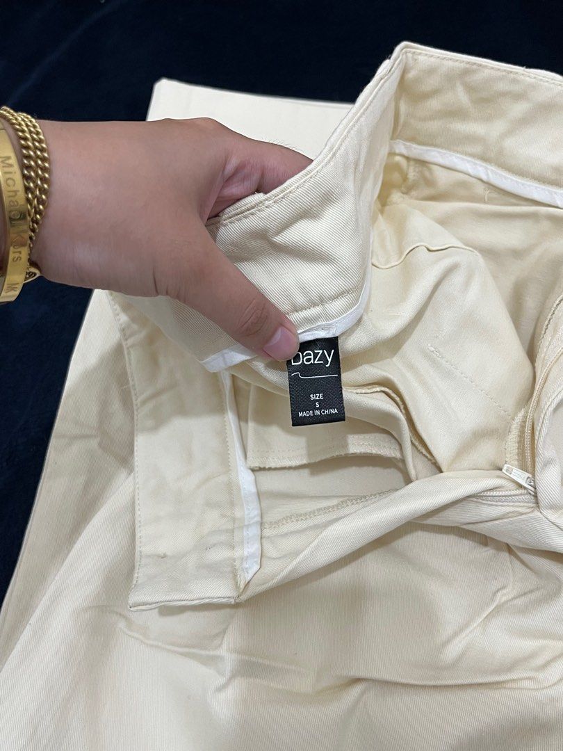 DAZY Cream Wide Leg Pants (Category: Other Bottoms) located in Cainta. Submitted by cblues (Listing ID 1404670447, Image 2). Description: - Dazy cream-colored wide-leg pants - Size S-M - Button and zipper closure - Pleats in the front, thick fabric - Used once, still in original packaging - Bought for 1,800 Cainta, Rizal.