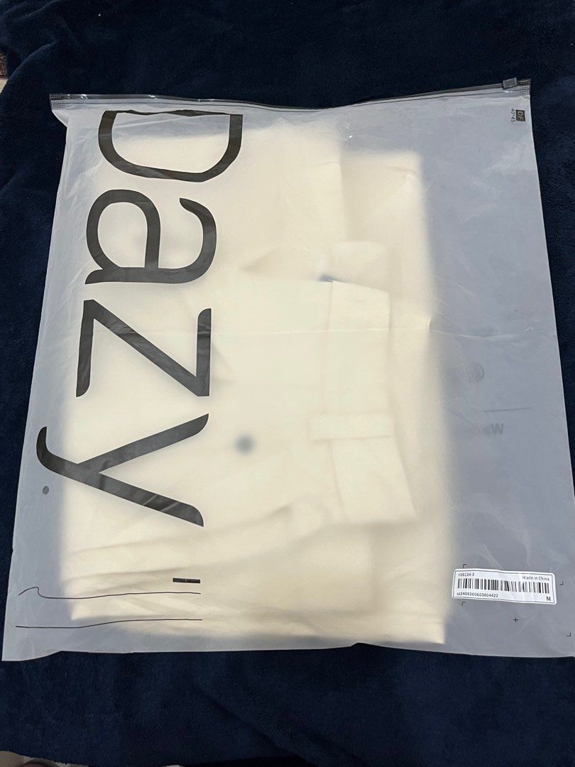 DAZY Cream Wide Leg Pants (Category: Other Bottoms) located in Cainta. Submitted by cblues (Listing ID 1404670447, Image 3). Description: - Dazy cream-colored wide-leg pants - Size S-M - Button and zipper closure - Pleats in the front, thick fabric - Used once, still in original packaging - Bought for 1,800 Cainta, Rizal.