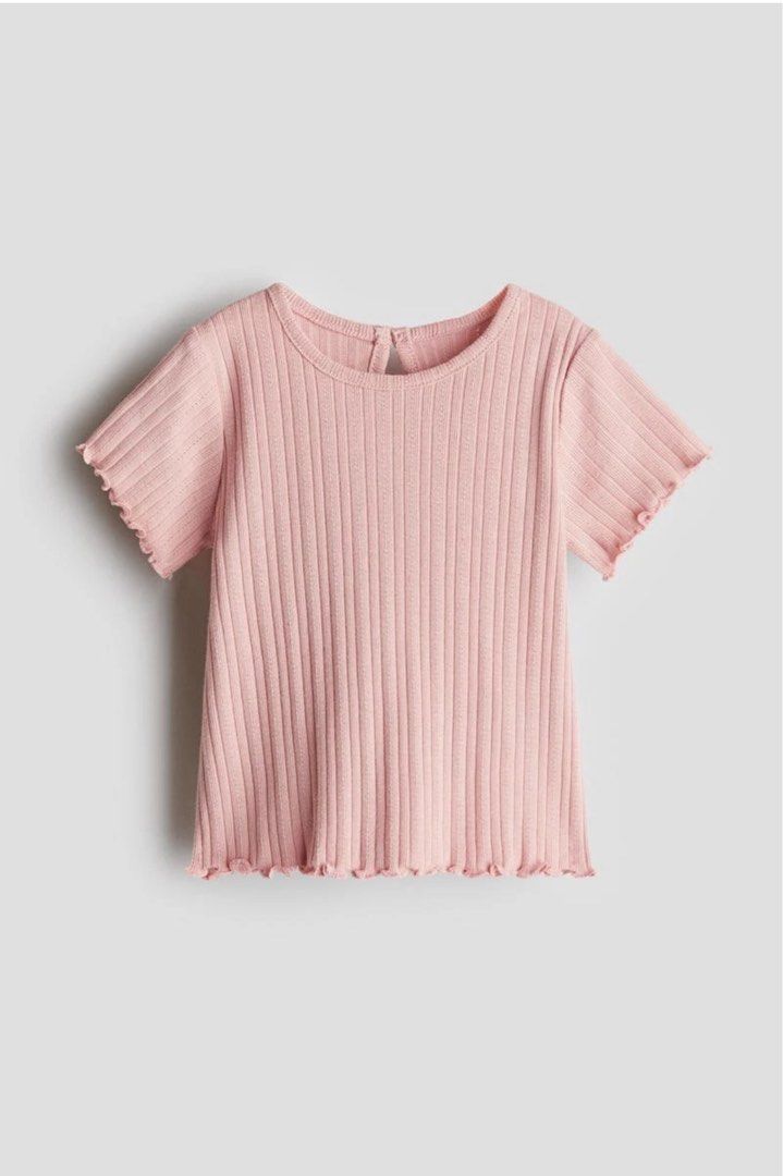 H&M Ribbed Jersey Top - Light Pink (9-12m) (Category: Babies & Kids Fashion) located in Marikina City. Submitted by libidibi (Listing ID 1404754815, Image 1). Description: Brand New with tag LP posted Size on tag: 9-12m - H&M Ribbed Jersey Top - Color: Light Pink - Features a round neckline - Short sleeves with a wavy hem - Small button closure at the back - Made from ribbed fabric.