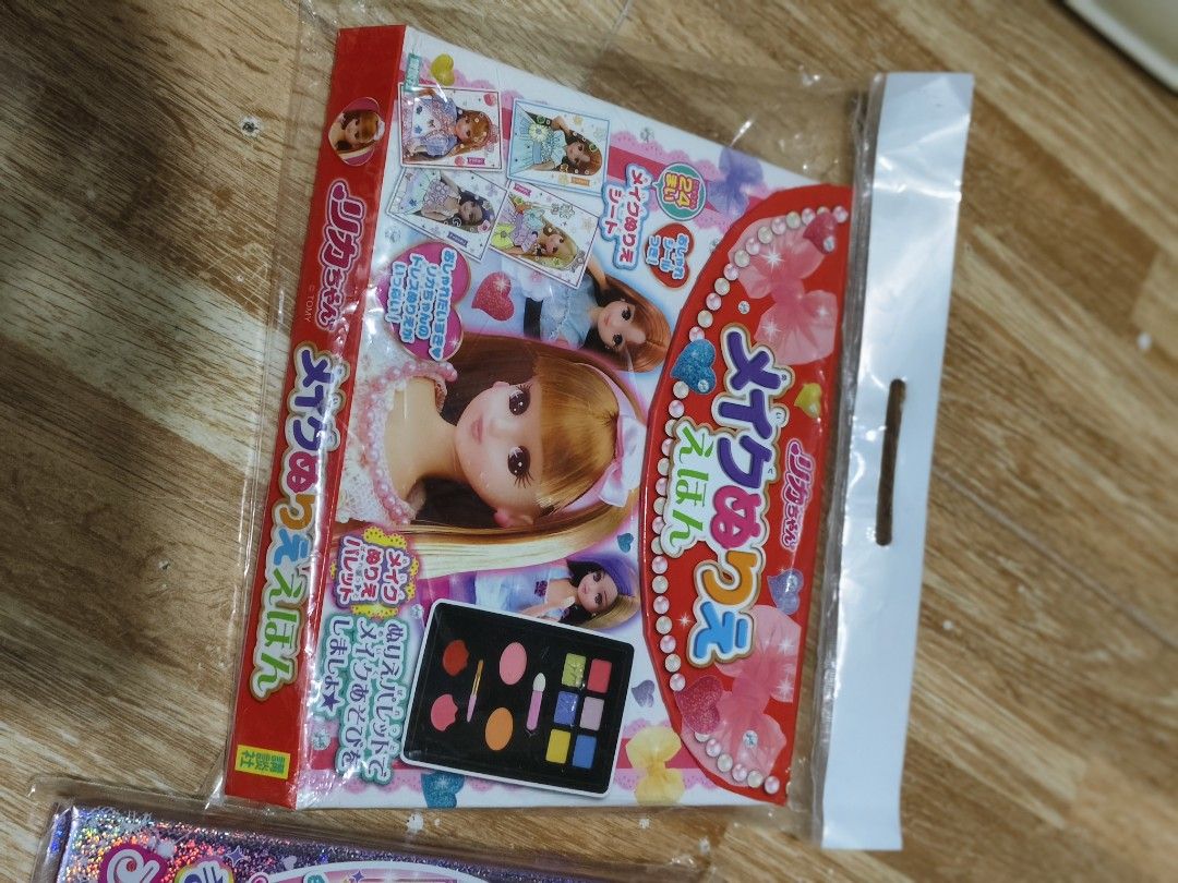 Licca-chan Makeup Palette and Book Set (Category: Makeup) located in Makati City. Submitted by abegailbrezuela (Listing ID 1404630187, Image 2). Description: - Licca-chan makeup set for sale! - Includes a makeup palette with eyeshadow and blush. - Also includes a makeup book featuring different looks. - Both items are in their original packaging. - Perfect for Licca-chan collectors and doll makeup enthusiasts..