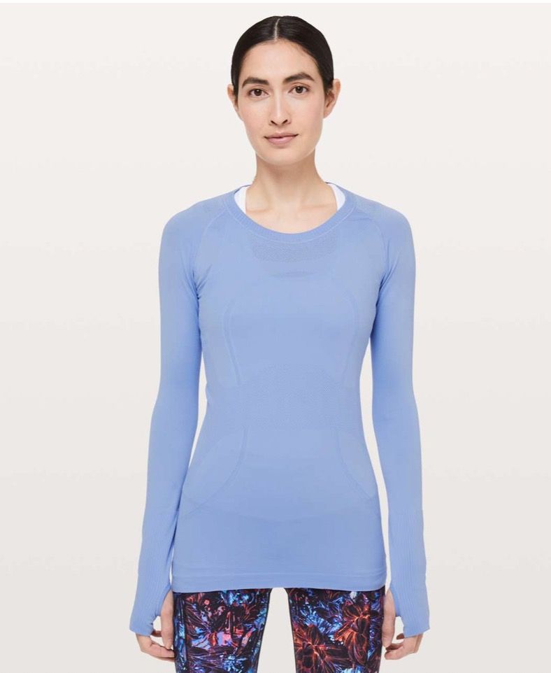 Lululemon SWIFTLY TECH LONG SLEEVE SHIRT - Size 4 (Category: Activewear) located in Paranaque City. Submitted by the_goodfind (Listing ID 1404616175, Image 3). Description: > Lululemon Swiftly Tech Long Sleeve Shirt > Looks pale in photos due to lighting, but really a vibrant light blue to lavender color (closest to Hydrangea Blue, see picture with model) > Size 4 > Made with nylon and elastane > Crew neck; long sleeves with ribbed cuffs; texture