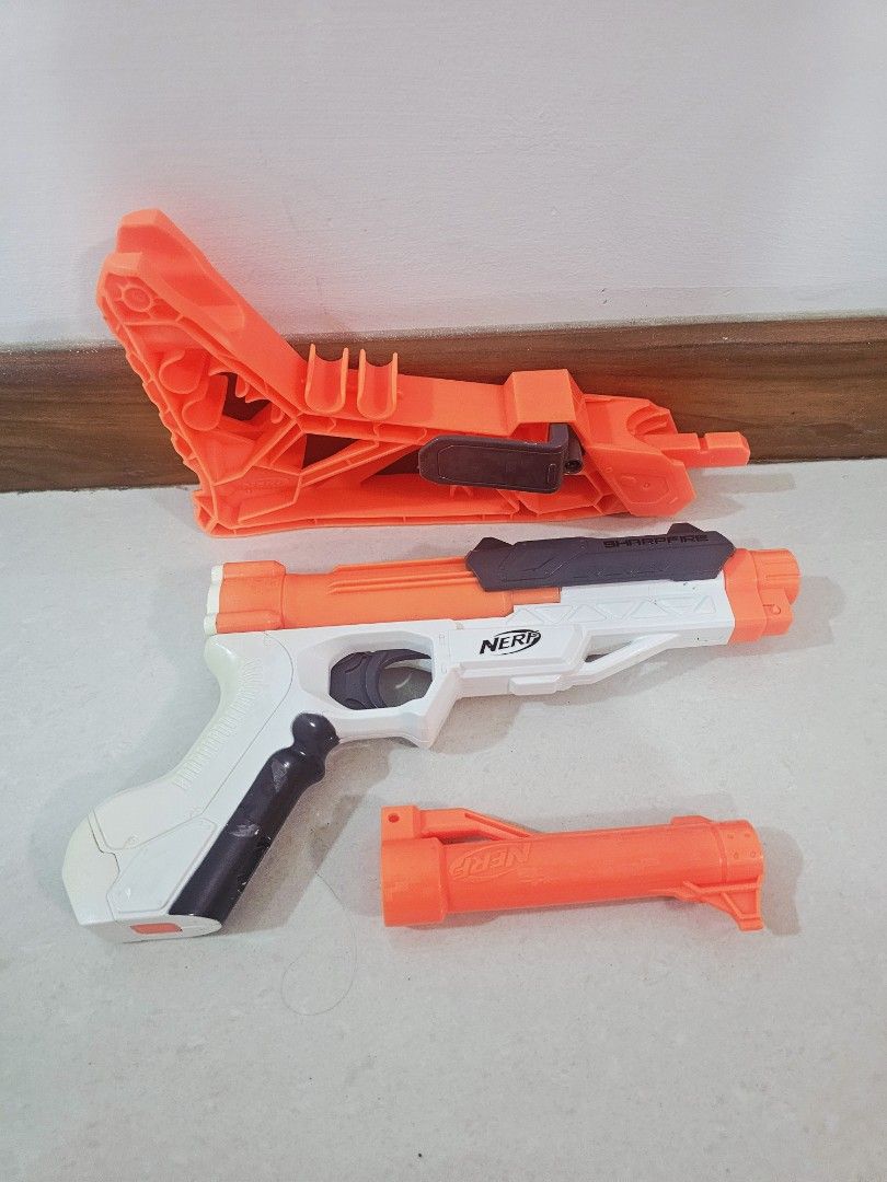Nerf SharpFire Blaster (Category: Action & Battle Toys) located in Singapore. Submitted by junyidummit (Listing ID 1404727707, Image 3). Description: 🔫 Nerf SharpFire Blaster – Good Condition! Selling my Nerf N-Strike SharpFire blaster. Condition: 8/10, fully working, no jams. Includes: Blaster only (no darts). Features: • Converts between pistol, holster, and stock mode • Slim, lightweight, easy to carry • Great for casual play or kids Perfect 