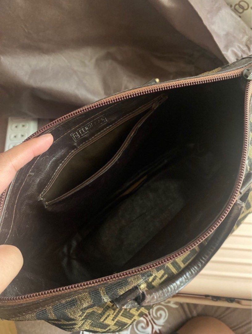 ORIGINAL FENDI ZUCCA BAG (Category: Luxury Bags & Wallets) located in Quezon City. Submitted by anneglico (Listing ID 1404754911, Image 3). Description: 100% authentic since it’s from Japan • The bag is too old or vintage to be replicated • Bag only + free bag organizer • With minimal issues as I already restored the bag RFS: Declutter MOP: Gcash/Bank transfer MOD: Grab delivery/Lalamove within Metro Manila. LBC if province. Buyer must pay for th