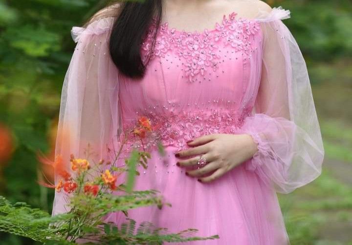 Pink Off-Shoulder Tulle Gown (Category: Evening dresses & gowns) located in Manila. Submitted by knm.studios (Listing ID 1404610053, Image 2). Description: WORE ONCE ONLY FOR DEBUT TEASER Clean and Good Condition can fit up to size XL, Perfect for debut, prom and any other special occasions ₱2000 only + SF - Pink off-shoulder fairy gown - Fitted bodice with floral embellishments - Sheer, puffy sleeves - Flowing tulle skirt (Bouquet not included) 