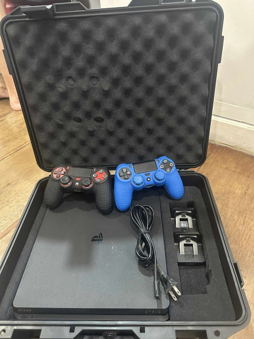 PS4 slim 1TB with Games (Category: PlayStation) located in Pasig City. Submitted by _mcmxc (Listing ID 1404699039, Image 1). Description: FS: PS4 Slim 1TB Inclusions: -Games -2 controllers -2 charging docks -PS4 case -CD rack 📍 Marikina City.