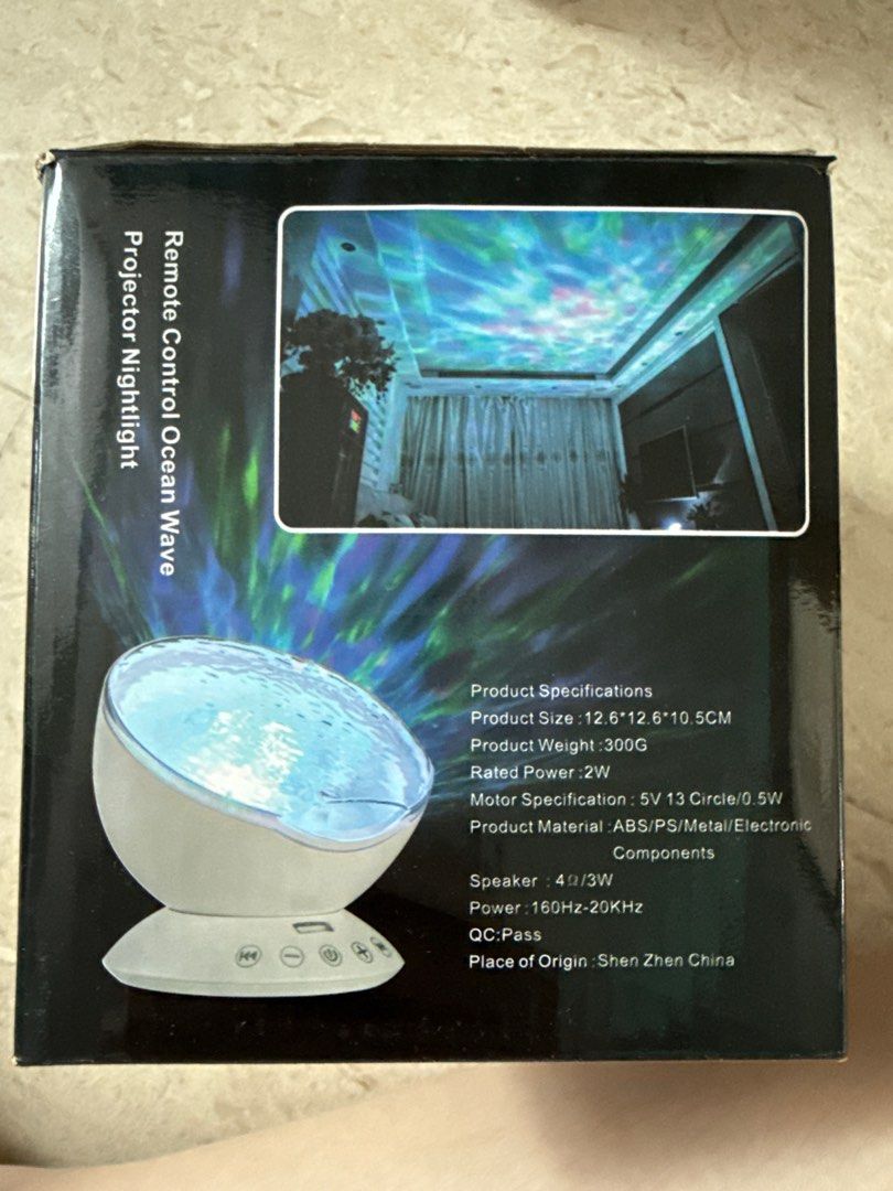 Remote Control Ocean Wave Projector Nightlight (Category: Projectors) located in Singapore. Submitted by danielyeow80 (Listing ID 1404597649, Image 3). Description: - Ocean Wave Projector Nightlight - Projects relaxing ocean wave patterns - Built-in speaker - Connects to mobile phones, computers, TF cards, and tablets - Made in China.