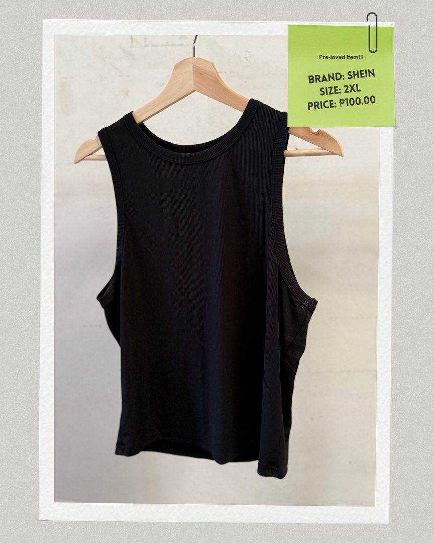 SHEIN Black Tank Top - 2XL (Category: Sleeveless) located in Quezon City. Submitted by calmfish.0f9fec (Listing ID 1404756853, Image 1). Description: - Pre-loved SHEIN tank top - Color: Black - Size: 2XL - Features: Round neckline, sleeveless - Style: Casual - Perfect for layering or wearing alone.