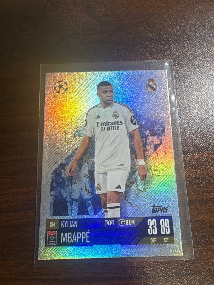 Topps Match Attax Kylian Mbappe Real Madrid 2024/2025 #134 (Category: Raw Cards) located in Singapore. Submitted by lollel1234 (Listing ID 1404711769, Image 2). Description: Kylian Mbappe Real Madrid card from Topps Match Attax Ideal for football card collectors sleeve provided with card.