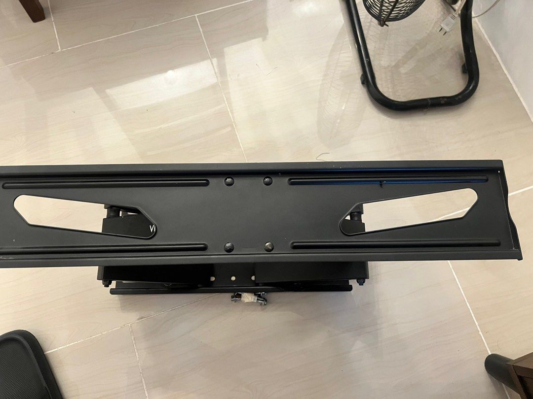 True Vision TV Wall Mount (Category: TV Parts & Accessories) located in Manila. Submitted by kilogramdynamite (Listing ID 1404769747, Image 3). Description: - True Vision TV wall mount - Full-motion: Tilts and swivels - Black color - Includes all mounting hardware - Sturdy and ready to install - Saves space.