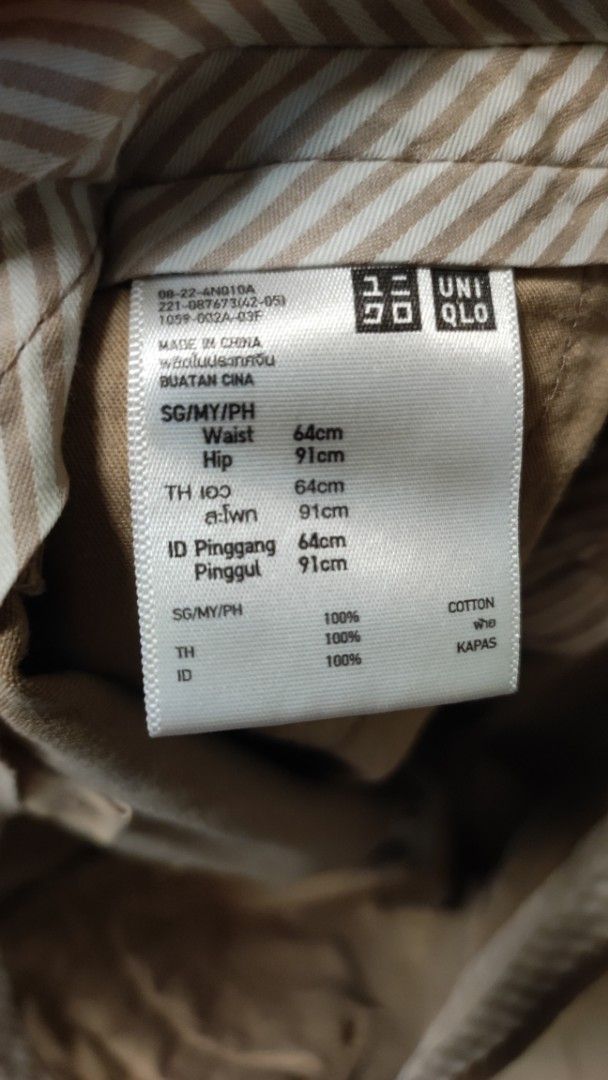 Uniqlo Cotton Shorts (Category: Other Bottoms) located in Manila. Submitted by sher09461 (Listing ID 1404647303, Image 2). Description: - Uniqlo cotton pants - Waist: 64cm - Hips: 91cm - Made in China - Fabric: 100% cotton - Includes TH and ID size information on tag - Versatile neutral color 100 pesos only for the price of 2.