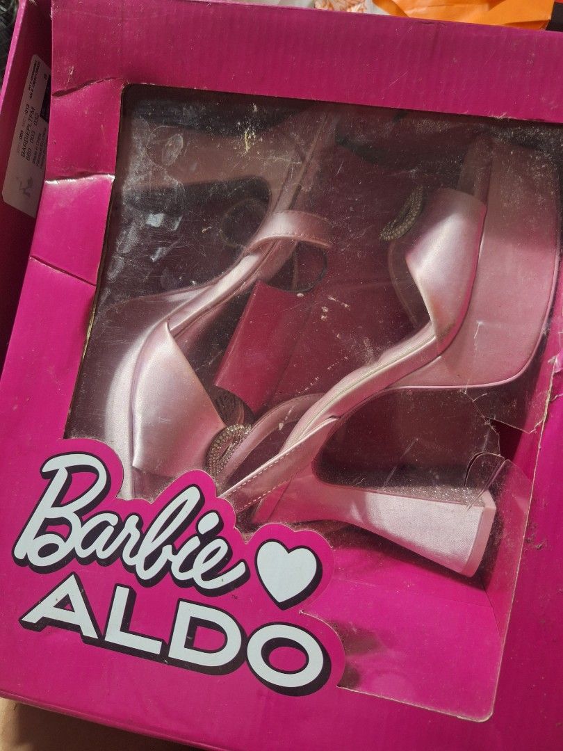(USED - LIKE NEW) Aldo x Barbie Platform Heels (Category: Heels) located in Makati City. Submitted by pengsuppp (Listing ID 1404755300, Image 3). Description: (Posting for my niece) Aldo x Barbie Platform Heels - US size 7.5 / EU 38 / UK 5 - Bought in Dubai - Box includes product details label - A bit of damage sa box bc of storage - Few dirt marks underneath since nagamit na po once sa graduation party. Selling for only 4000. Slightly negotiable
