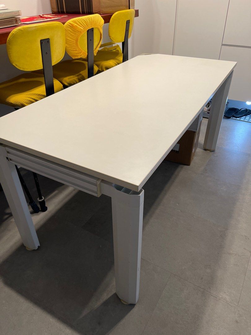 White Rectangular Table (Category: Tables & Sets) located in Singapore. Submitted by moilim (Listing ID 1404618169, Image 2). Description: - White rectangular table Office for work, computer table, study table … etc Size: D75cm x W160cm x H75cm Well kept as well as well used - feature with wire compartment under table - Clean, modern design - Sturdy white legs - Suitable for study or dining - Ready for immediate use.