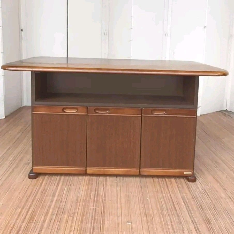 Wooden Table with Storage (Category: Tables & Sets) located in Manila. Submitted by eloizavill76462 (Listing ID 1404711765, Image 1). Description: Tocom Kitchen Island / Extendable Table with Storage L43 x W18-25.5 x H25.5 In good condition .