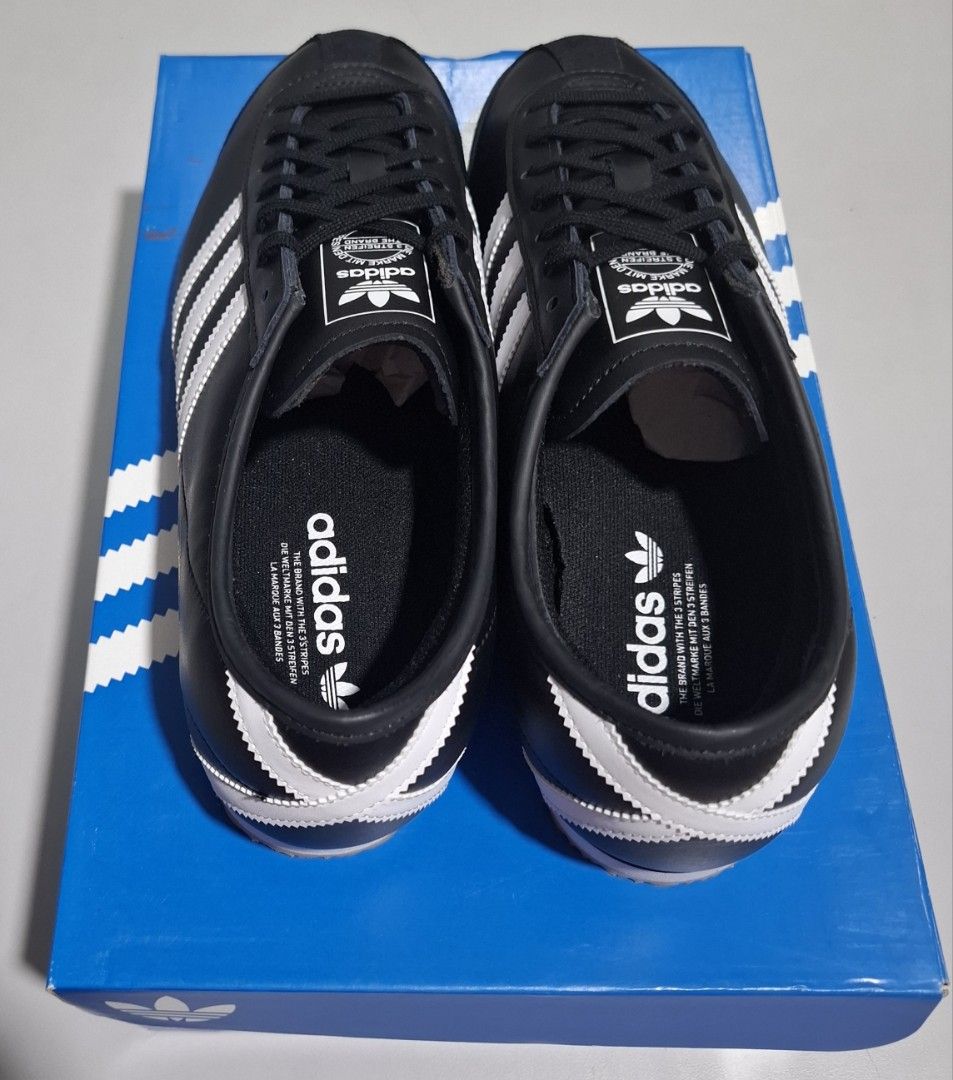 Adidas Italia 70s Sneakers (Category: Sneakers) located in Makati City. Submitted by decluttermp (Listing ID 1404855972, Image 3). Description: Brand New Authentic Size 10.5 US (best fits size US 10 - 10.5 ) Retro classic styling Regular fit Lace closure Leather upper Rubber gum outsole Colour: Core Black / Cloud White Product code: JS1324 Regular price: Php 6,800.