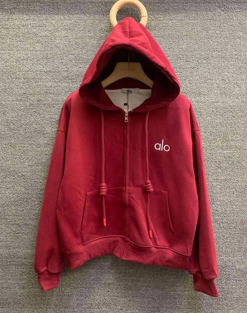 Alo Zip-Up Hoodie (Category: Coats, Jackets and Outerwear) located in Manila. Submitted by rocillocin64338 (Listing ID 1404792037, Image 2). Description: - Alo zip-up hoodie - Hood with drawstrings - Front zipper - Two front pockets - Embroidered Alo logo - Available colors: White, Red, Brown, Black, Grey, Pink - Comfortable for everyday wear.