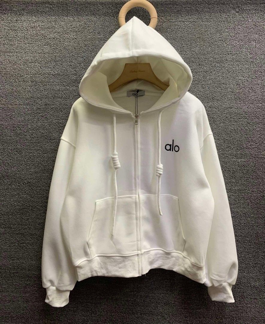 Alo Zip-Up Hoodie (Category: Coats, Jackets and Outerwear) located in Manila. Submitted by rocillocin64338 (Listing ID 1404792037, Image 1). Description: - Alo zip-up hoodie - Hood with drawstrings - Front zipper - Two front pockets - Embroidered Alo logo - Available colors: White, Red, Brown, Black, Grey, Pink - Comfortable for everyday wear.