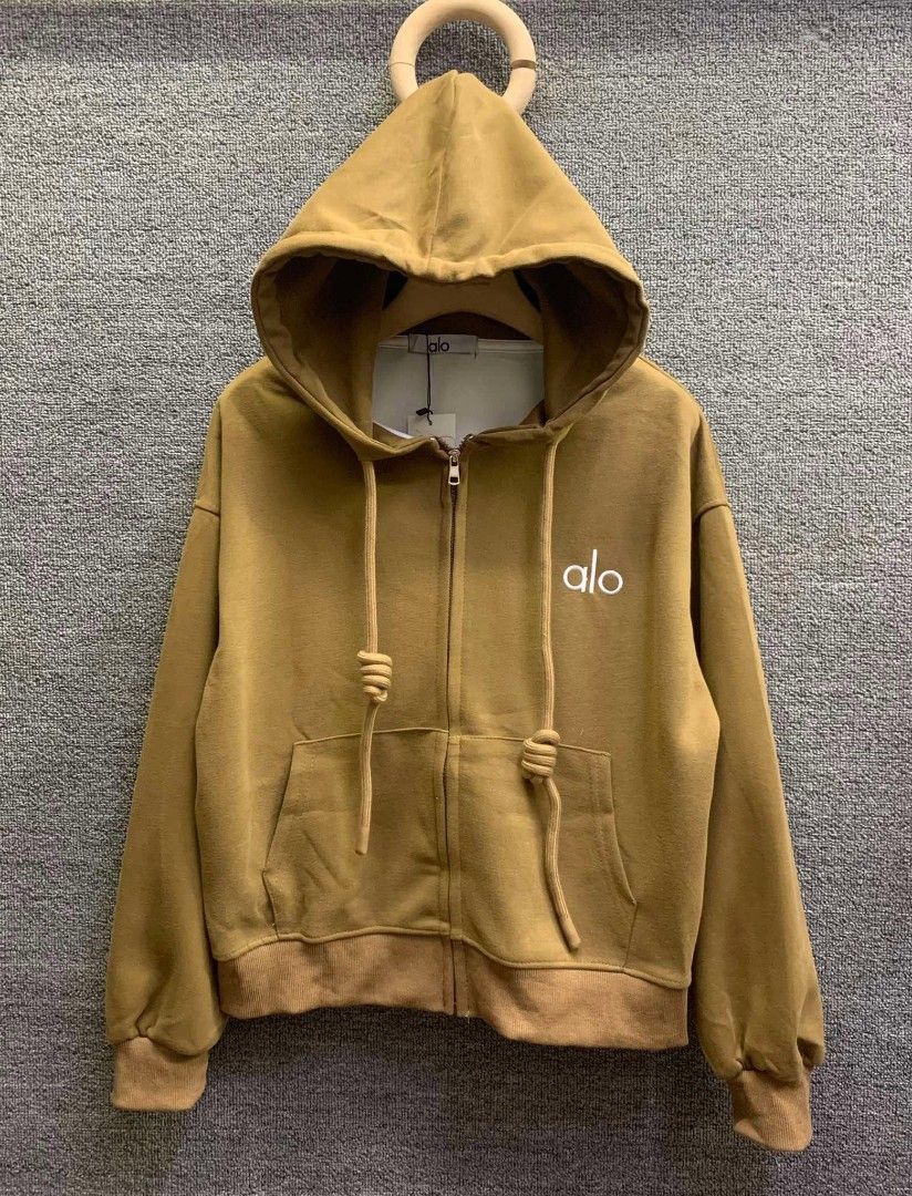 Alo Zip-Up Hoodie (Category: Coats, Jackets and Outerwear) located in Manila. Submitted by rocillocin64338 (Listing ID 1404792037, Image 3). Description: - Alo zip-up hoodie - Hood with drawstrings - Front zipper - Two front pockets - Embroidered Alo logo - Available colors: White, Red, Brown, Black, Grey, Pink - Comfortable for everyday wear.