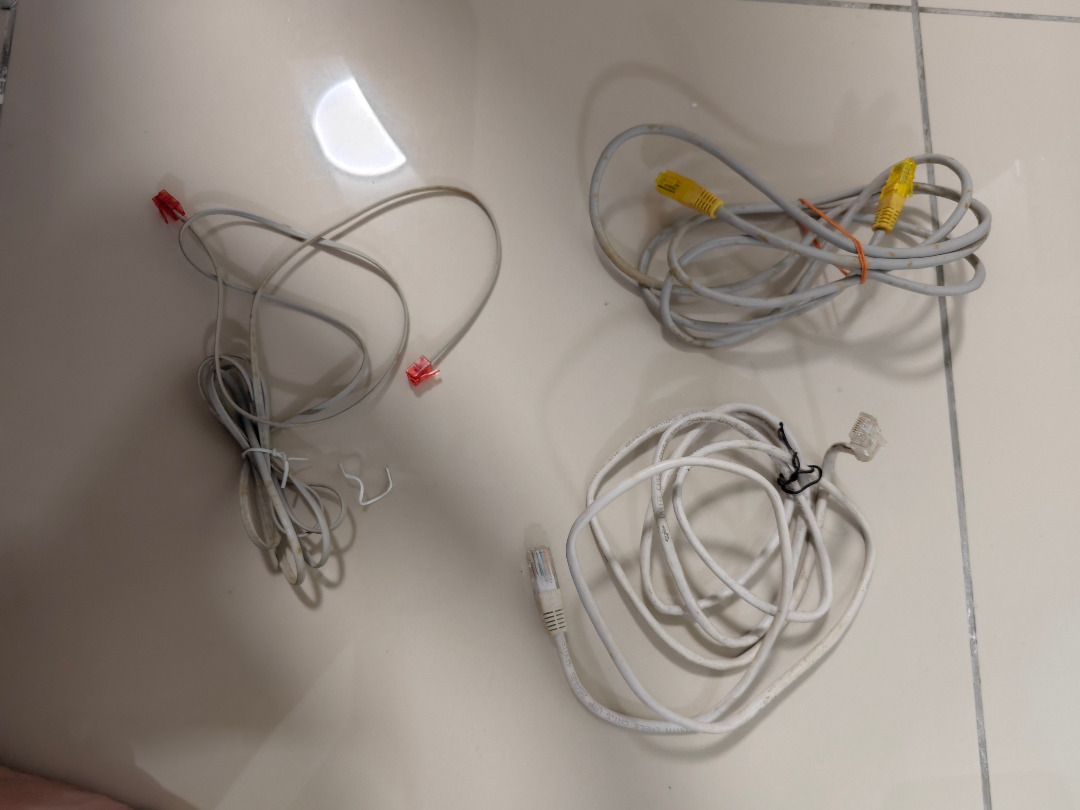 Assorted Network Cables (Category: Cables & Adaptors) located in Kuala Lumpur. Submitted by tkwmmmx (Listing ID 1404917337, Image 1). Description: 2*Lan Cable & 1*Phone Cable. Free, self pickup.