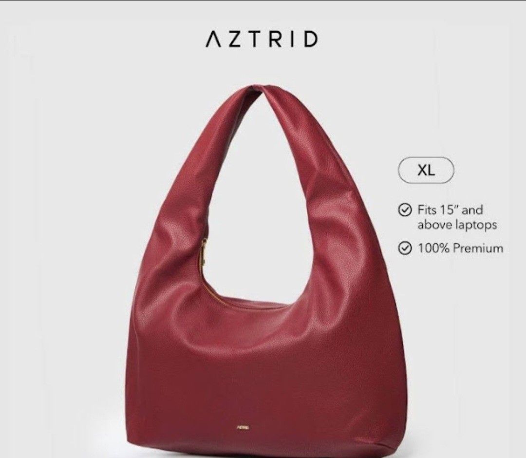 Aztrid Hobo bag (Category: Luxury Bags & Wallets) located in Manila. Submitted by glamourfashionclothing (Listing ID 1404922745, Image 1). Description: used once burgundy color very elegant and sturdy spacious.