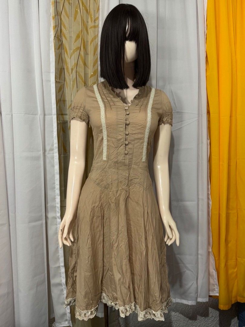 Beige Button-Front Dress (Category: Dresses) located in Quezon City. Submitted by everydayessentialsstudio (Listing ID 1404947157, Image 2). Description: A vintage-inspired brown dress with button details along the bodice. Perfect for casual styling or earthy-toned outfits. Features: • XS to Semi-Small • Button-front detail • Midi length • Earthy brown tone • Vintage-inspired look #BeigeDressPH #VintageDressPH #PrelovedFinds #ClosetReVibe #EarthT