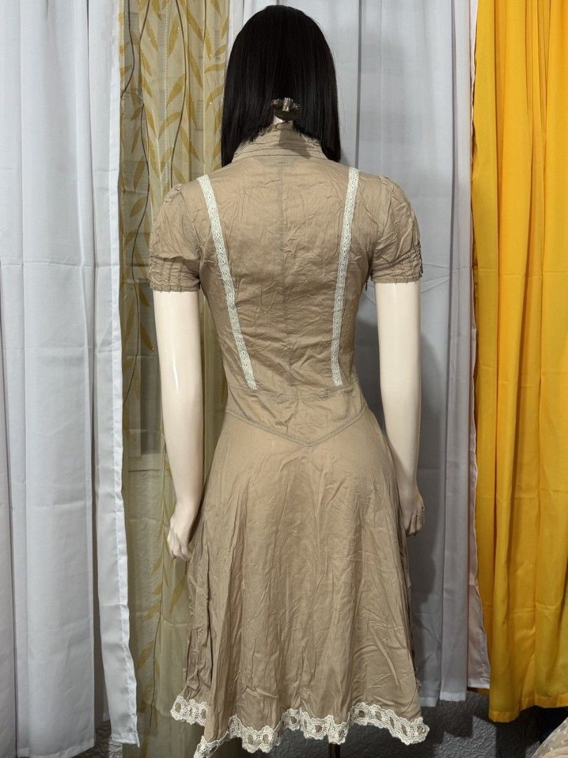 Beige Button-Front Dress (Category: Dresses) located in Quezon City. Submitted by everydayessentialsstudio (Listing ID 1404947157, Image 3). Description: A vintage-inspired brown dress with button details along the bodice. Perfect for casual styling or earthy-toned outfits. Features: • XS to Semi-Small • Button-front detail • Midi length • Earthy brown tone • Vintage-inspired look #BeigeDressPH #VintageDressPH #PrelovedFinds #ClosetReVibe #EarthT